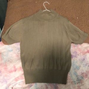 Green turtle neck shirt